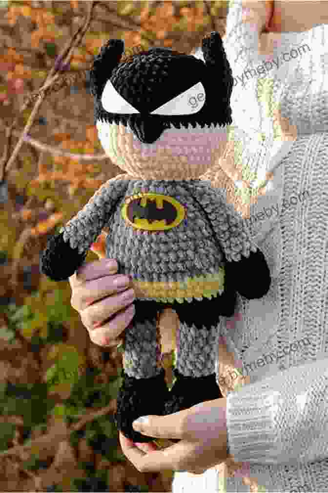 A Group Of Enthusiastic Crocheters Displaying Their Unique Batman Amigurumi Creations, Demonstrating The Vibrant And Supportive Community. Crochet Batman Pattern