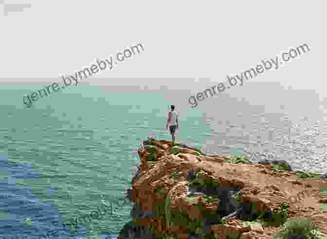 A Photo Of A Person Standing On The Edge Of A Cliff, Looking Out At The Vast Expanse Of The Ocean. At The Edge Of Development: Health Crises In A Transitional Society