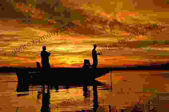 A Silhouette Of A Fisherman Casting A Line Into A Peaceful Lake At Sunset Fishing In The Good Old Days: Was It Really Better?