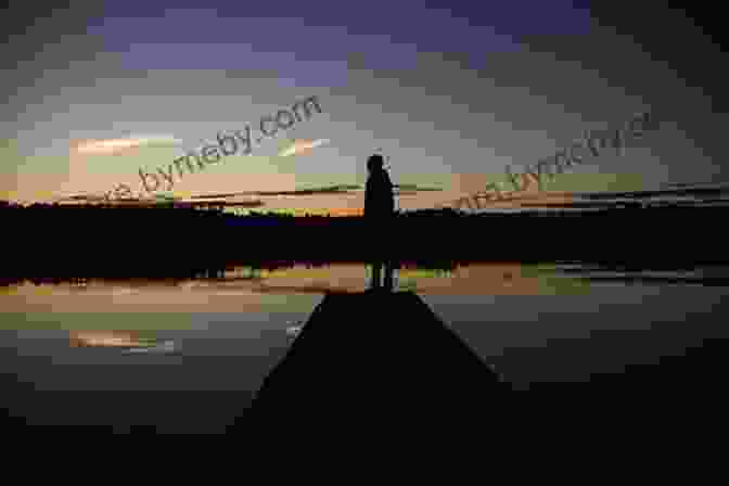 A Silhouette Of A Fisherman Standing On A Dock, Admiring The Vibrant Sunrise Over A Tranquil Lake Fishing In The Good Old Days: Was It Really Better?